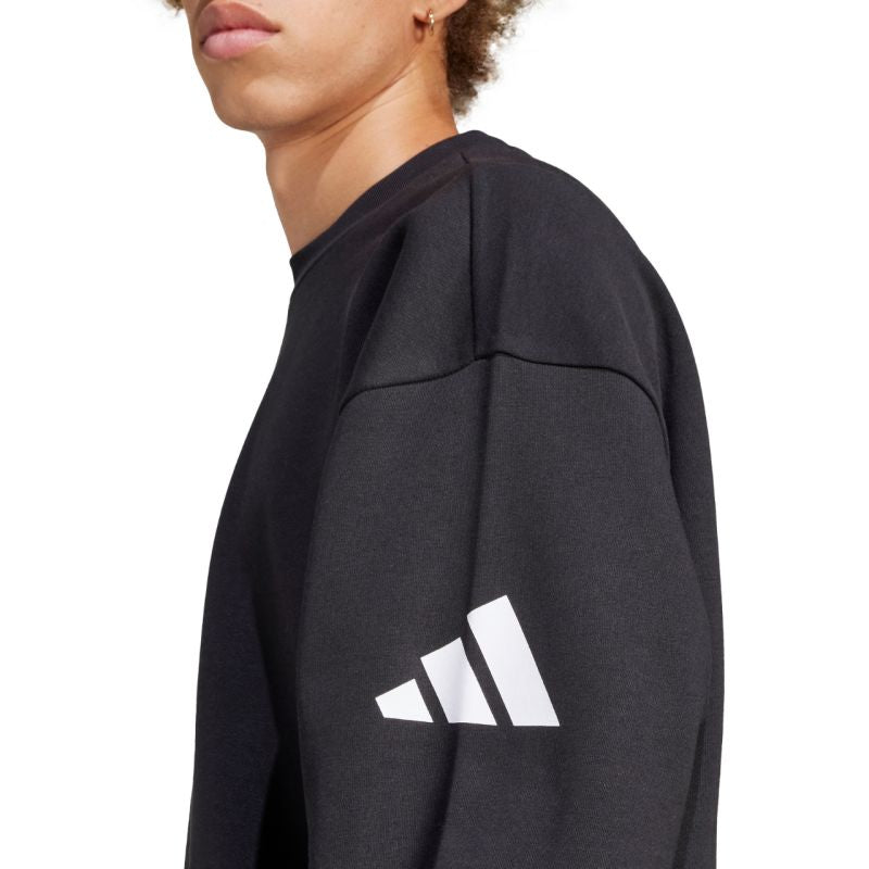 Felpa girocollo da uomo adidas Essentials Loose Fit con logo a 3 barre nero JF3542